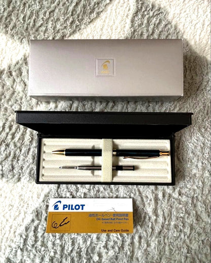 PILOT ballpoint pen set with black ink in deep green body displayed with gift box