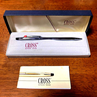 Coca-Cola CROSS ballpoint pen in sleek design with brand logo, shown in close-up on a white background