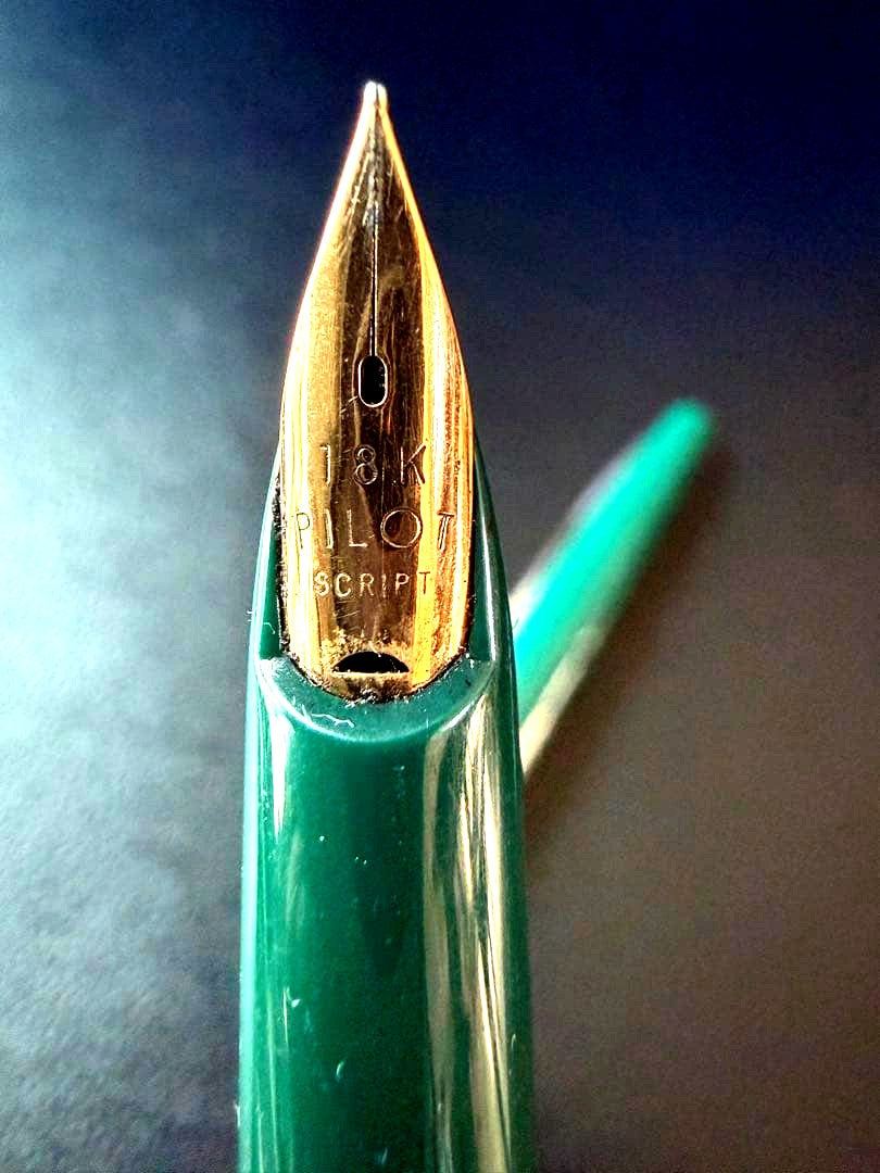 Pilot SCRIPT fountain pen with 18K nib in green color shown at a slight angle