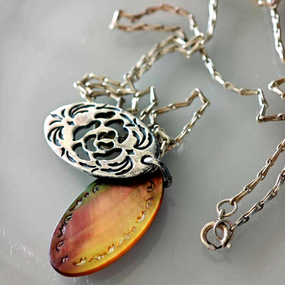 Agete silver necklace with 2.9cm shell and metal filigree charm on a 50cm chain