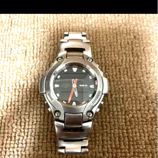 Casio G-Shock MR-G series stainless steel watch with silver case and bracelet
