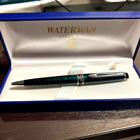 WATERMAN green ballpoint pen with marble pattern and dedicated case shown on white background