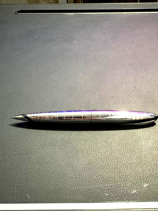 Used Cross Radial Chrome ballpoint pen with streamlined design on white background