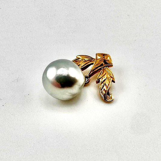 Mikimoto K14 pearl pendant featuring a blue-tinged 8-9mm pearl with a leaf motif in a vintage design