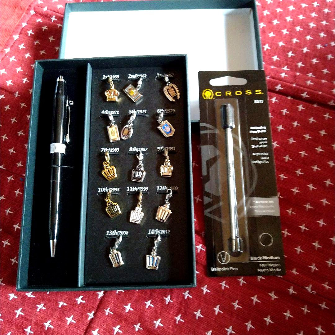 Crown brand black ballpoint pen with included gift box and replacement ink cartridges