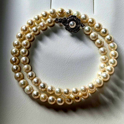 Akoya pearl necklace featuring 6.5-7mm white round pearls with silver clasp and 41cm length