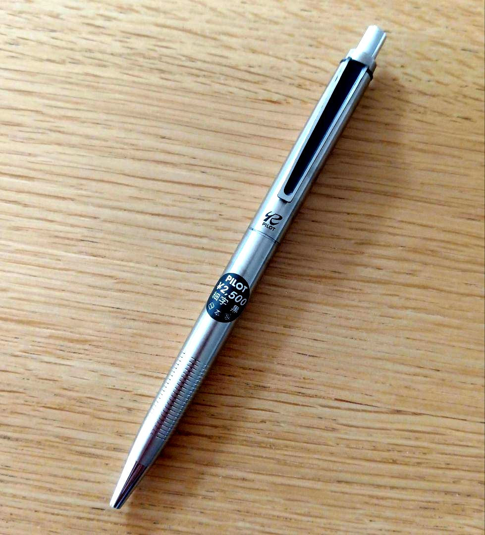 Pilot knock type ballpoint pen with silver metal shaft and black fine point ink
