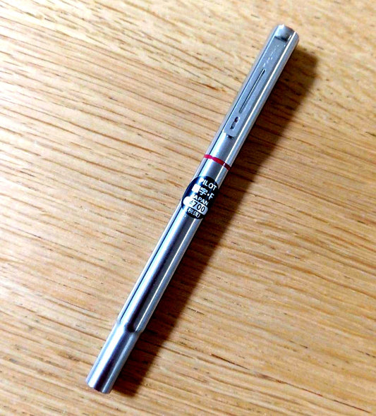 Pilot Birdie Mini Fountain Pen with silver and red body and fine nib displayed on white background