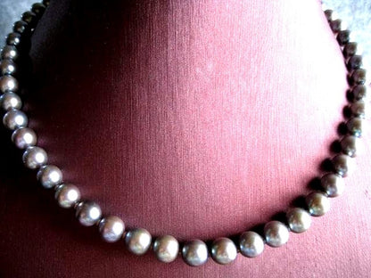 Akoya pearl necklace 7.0-7.5mm pearls with silver fittings, 42cm length, displayed on white background