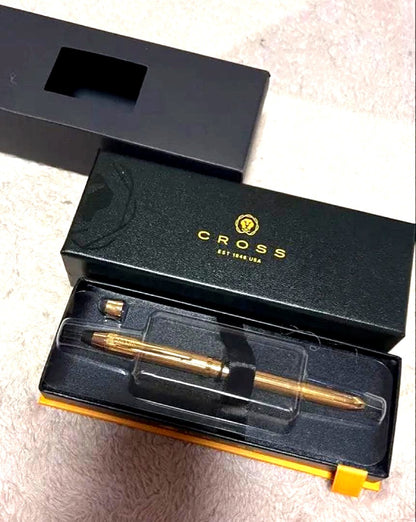 Cross ballpoint pen with gold tip and gold body, unused with name written, no box included