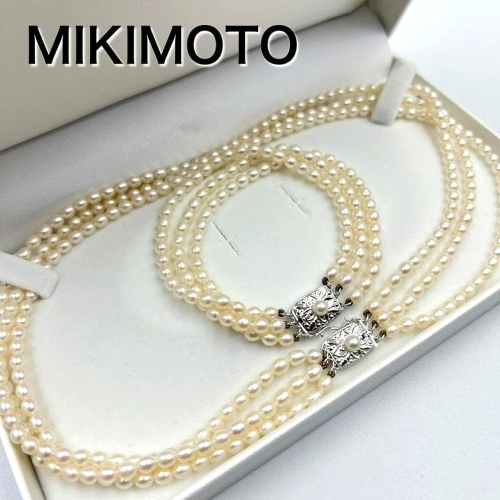 MiMOTO 3-strand silver necklace and bracelet set featuring 4mm pearls on a white background
