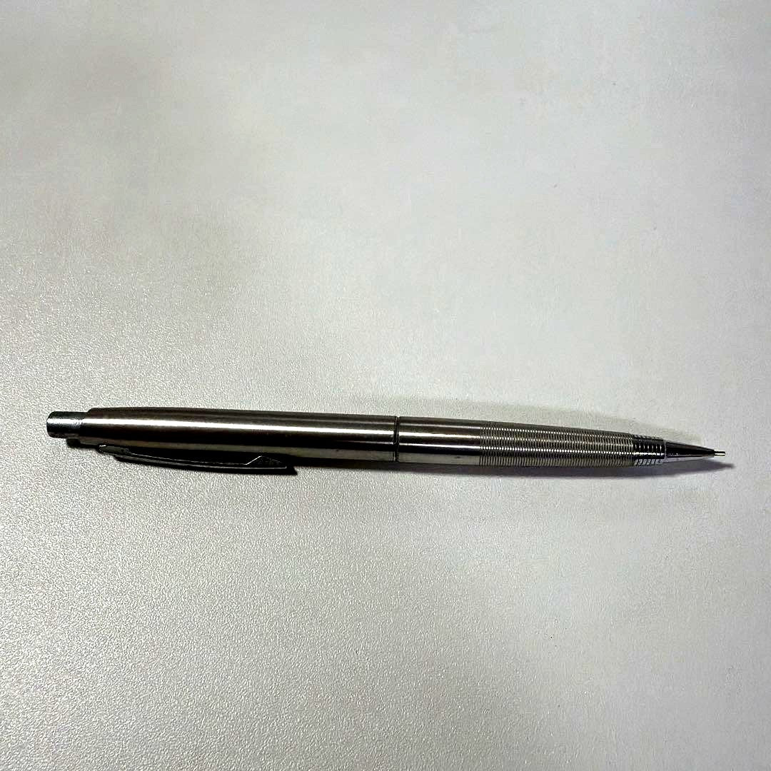 Vintage PILOT silver mechanical pencil with slim metal body and clip on a white background