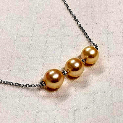 Akoya genuine pearl necklace with 3 champagne light gold pearls on a sterling silver 3 strand chain