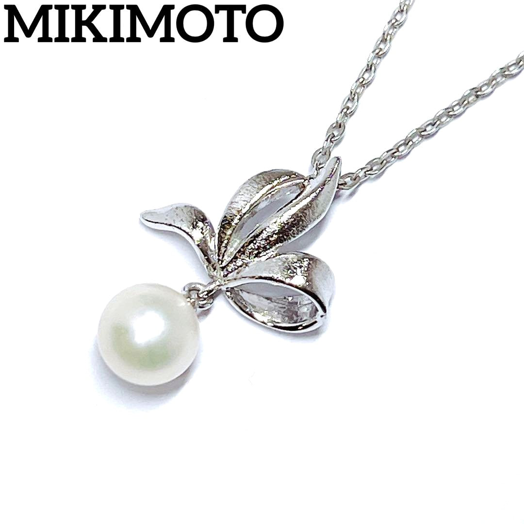 Mikimoto pearl necklace with 6.7mm pearls featuring ribbon, flower, and leaf silver design on 40cm chain