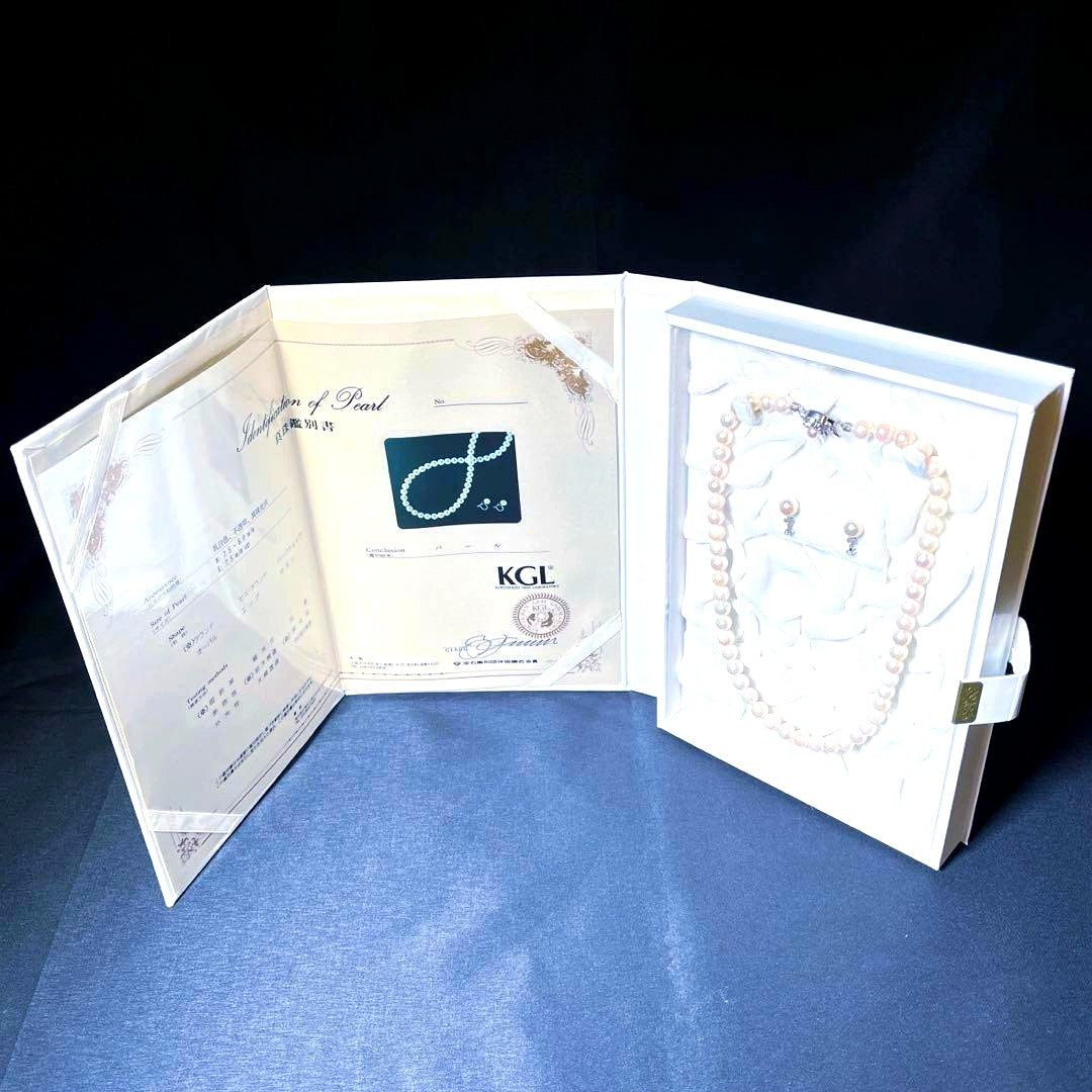 K14 Akoya pearl necklace and matching earrings with round 7.5 to 8mm pearls and silver marking