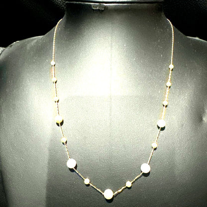 Perlagione Akoya baby pearl necklace in 14K gold with 42 cm length displayed on a jewelry stand