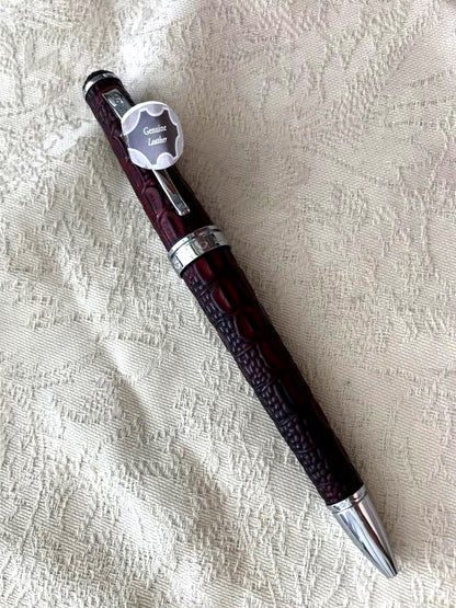 Cross leather ballpoint pen with metal body and revolving mechanism in black color, 5.5 inches long