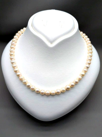 Akoya genuine pearl necklace with 7mm white pearls and silver clasp measuring 41.5cm