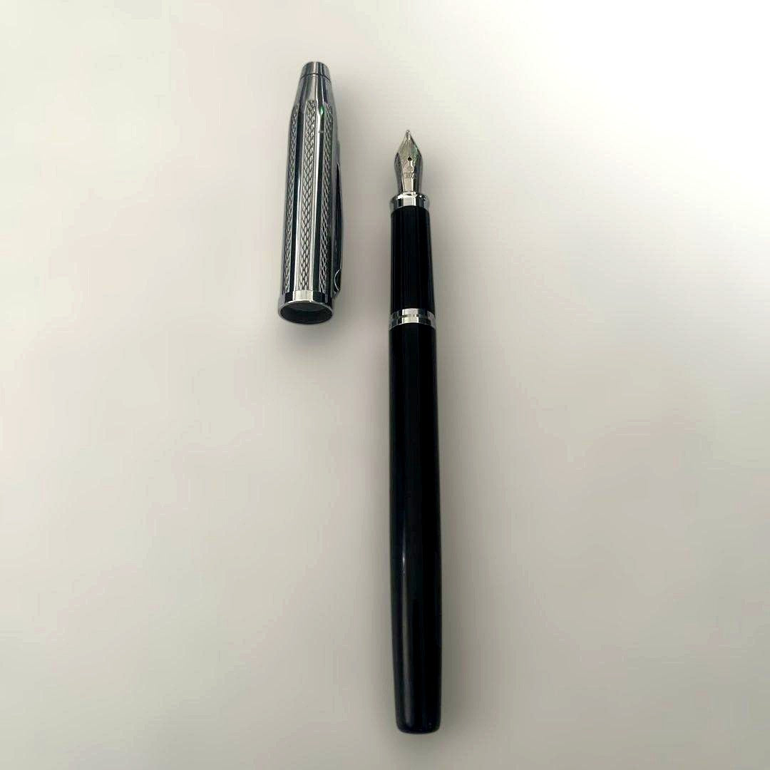 Cross Century II fountain pen with sterling silver body and black lacquer, platinum-coated M nib, and cap mechanism