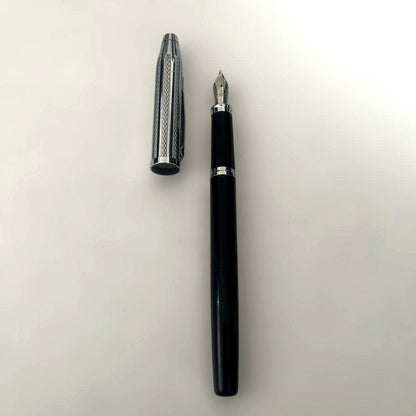 Cross Century II fountain pen with sterling silver body and black lacquer, platinum-coated M nib, and cap mechanism