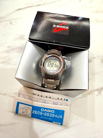 Casio G-Shock MT-G Series solar-powered watch with metal band and original packaging