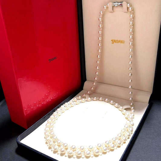 TASAKI Pearls Vari Aoyama 120cm pearl necklace with crystal clasp and silver marking on white background