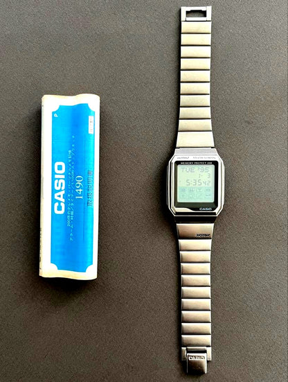 Casio HotBiz VDB-2000 touch screen digital data bank watch showing black case and digital display