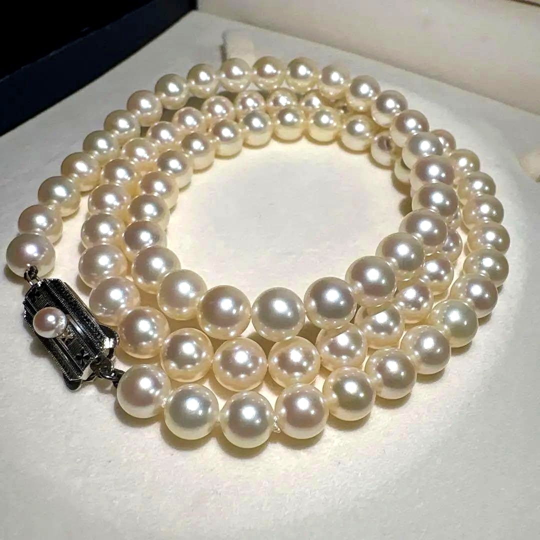 Mikimoto Akoya pearl necklace measuring 56cm with white and cream tone pearls sized 6.4 to 6.9mm