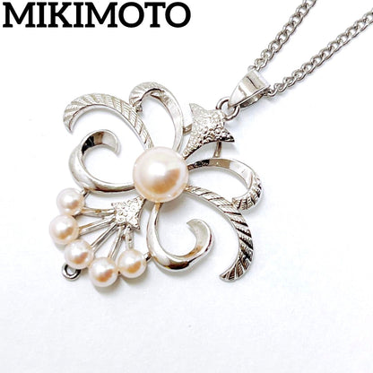 Mikimoto pearl necklace pendant with silver chain and round pearls measuring 2.9-5.8mm