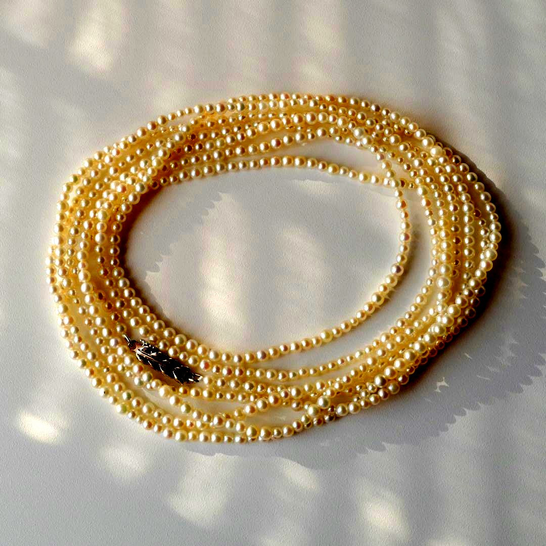 New Akoya pearl necklace with very small 2-3mm ivory pearls on a 64 inch silver chain