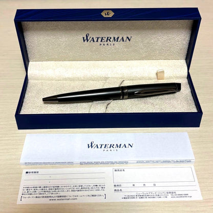 WATERMAN Expert Metallic Black ballpoint pen with included accessories on white background