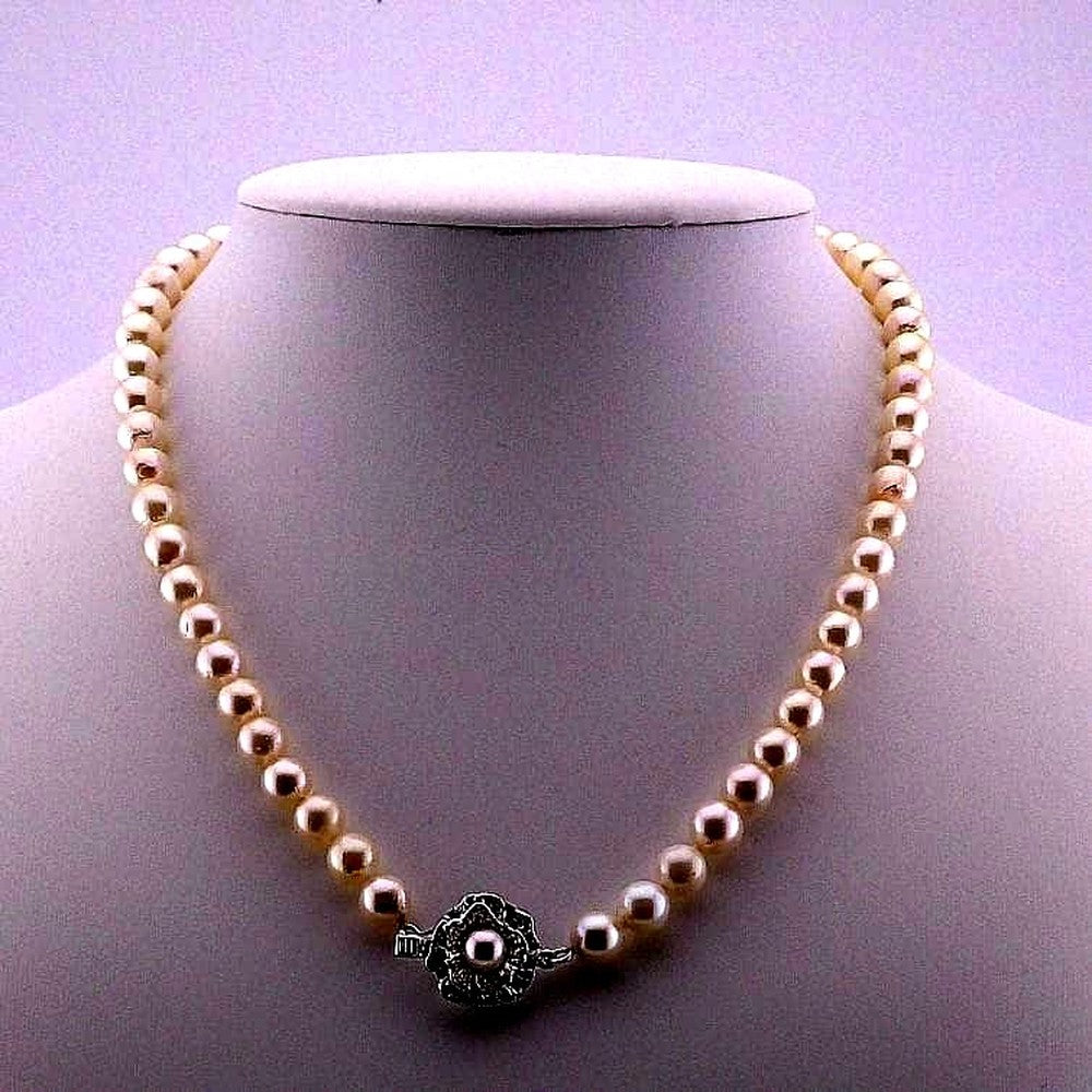 Aoyama pearl necklace featuring 6.5-7.0mm Akoya pearls with silver stamped fittings on a 42cm chain