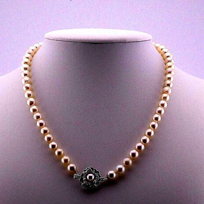 Aoyama pearl necklace featuring 6.5-7.0mm Akoya pearls with silver stamped fittings on a 42cm chain