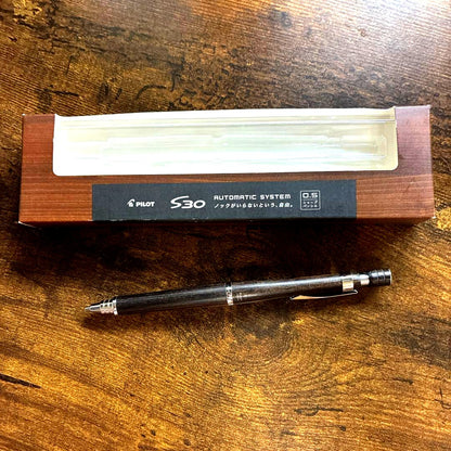 PILOT S30 mechanical pencil with 0.5mm lead and wood body shown with its body case