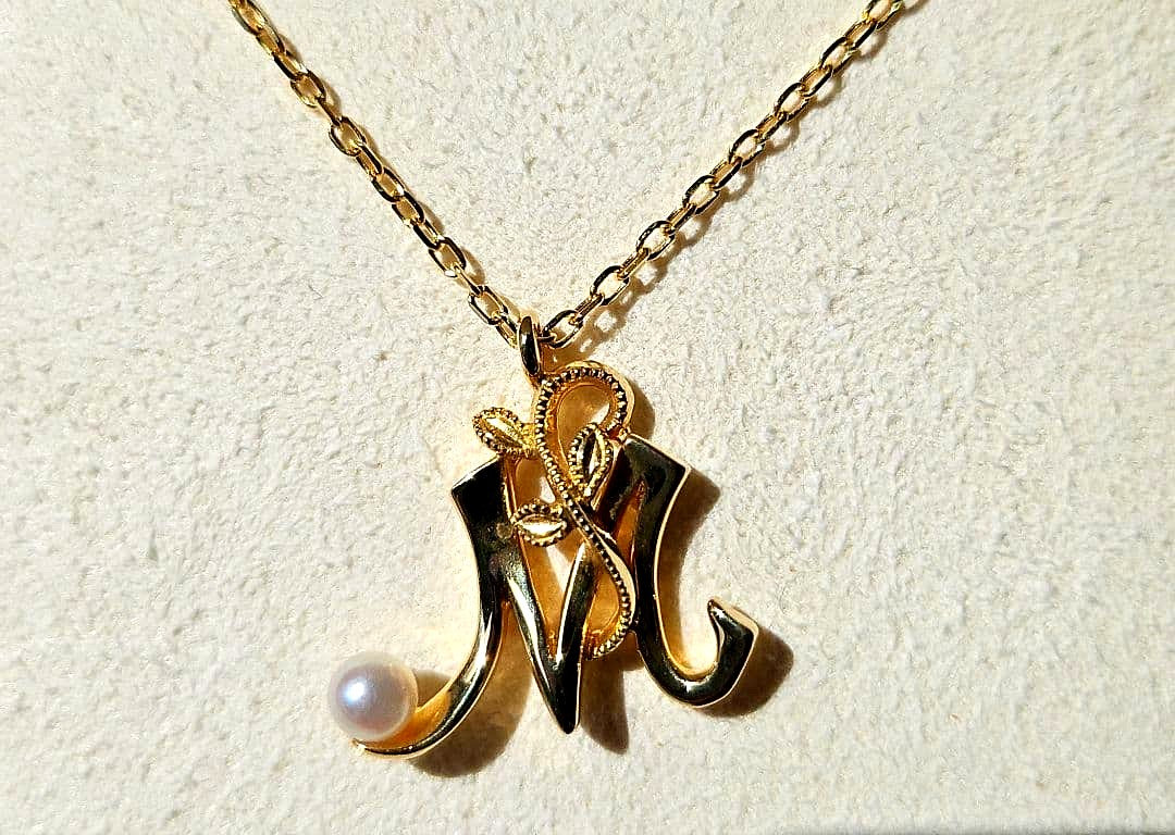 Mikimoto Baby Pearl Necklace with Initial M pendant in 18K yellow gold, 42cm chain, displayed with box