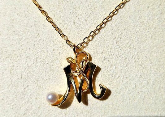 Mikimoto Baby Pearl Necklace with Initial M pendant in 18K yellow gold, 42cm chain, displayed with box