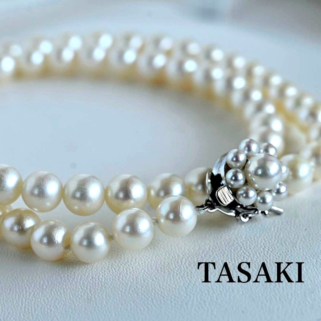 Takaski pearl necklace featuring 6.5mm Akoya round pearls and silver clasp on a white background