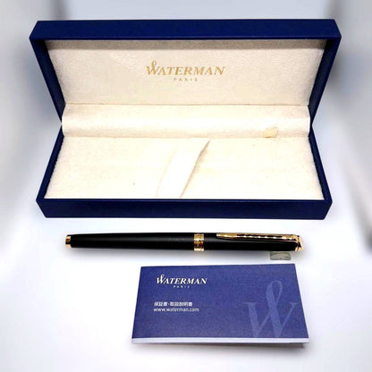 Waterman Matte Black Fountain Pen with fine nib and metal body displayed with case and instruction manual