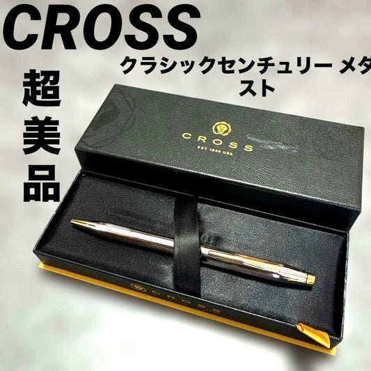 Cross Classic Century Medalist ballpoint pen with silver chrome plated body and gold clip and conical cap top