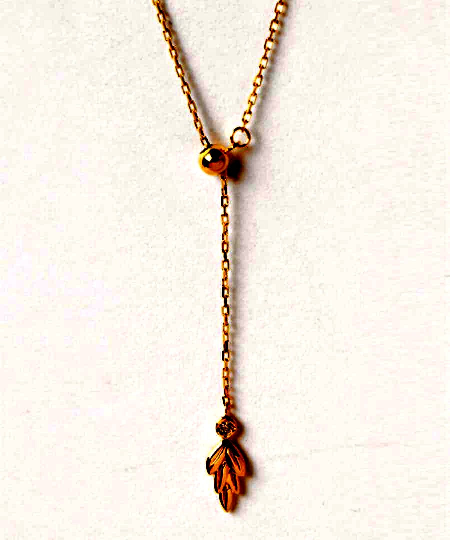 agete K10 gold Y-shaped necklace with a single diamond leaf pendant and sliding ball chain