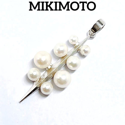 Mikimoto baby pearl necklace pendant top with silver chain and pearls sized 2.4 to 4.5 mm