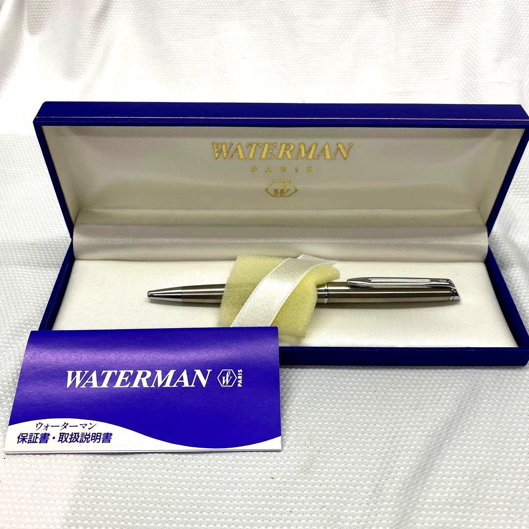 Waterman ballpoint pen made of metal showing signs of aging with included protective case