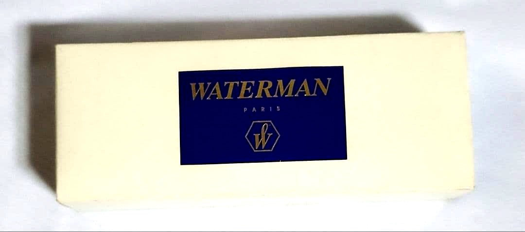 Unused WATERMAN ballpoint pen with original box showing some dirt on cover