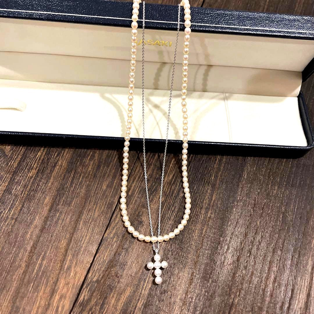 Tasaki Pearl Baby Pearl Necklace Set in silver featuring one-string pearl necklace and adjustable pearl cross necklace chain