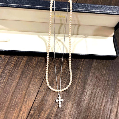 Tasaki Pearl Baby Pearl Necklace Set in silver featuring one-string pearl necklace and adjustable pearl cross necklace chain