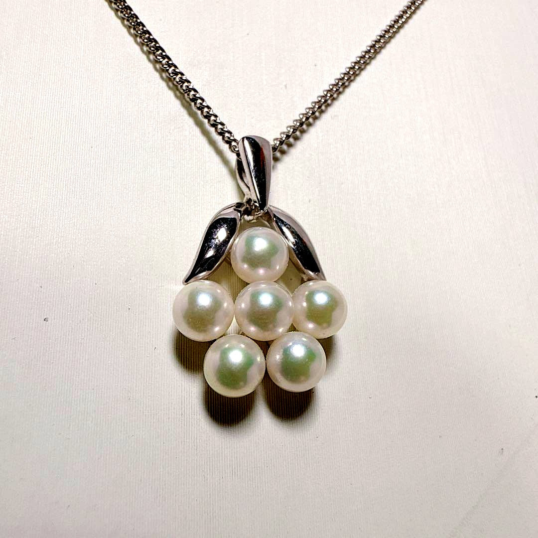 Mikimoto silver necklace featuring six Akoya baby pearls on a 40cm chain
