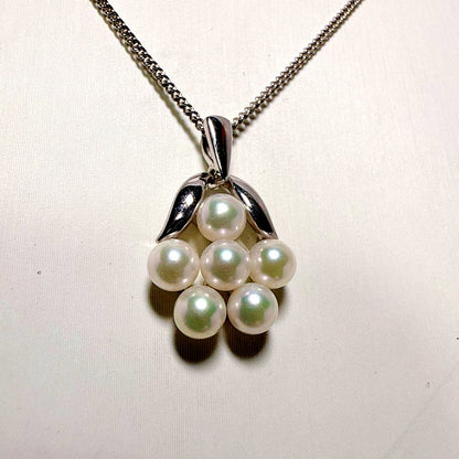 Mikimoto silver necklace featuring six Akoya baby pearls on a 40cm chain