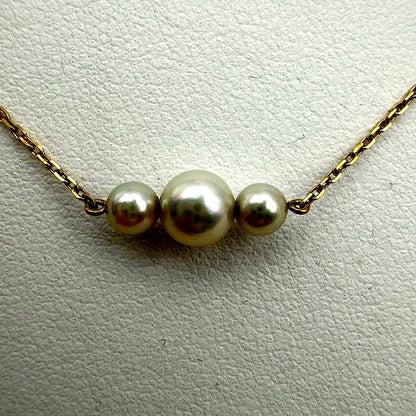MIKIMOTO K18 necklace with 4.3 to 6.1 mm pearls, 38 cm length, displayed on white background