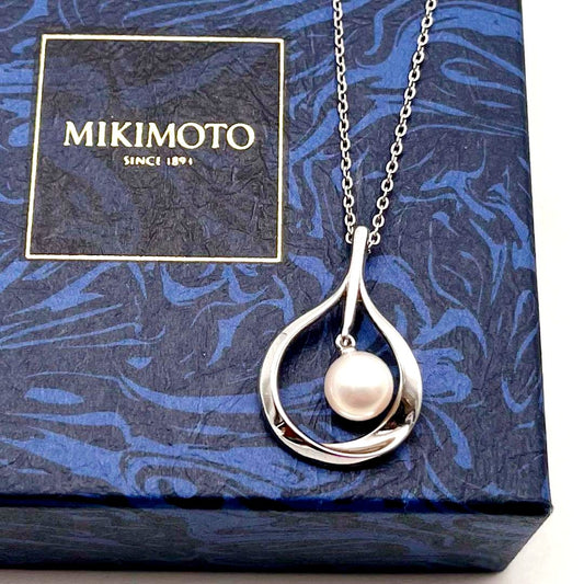 Mikimoto necklace with a single white genuine pearl on a silver chain
