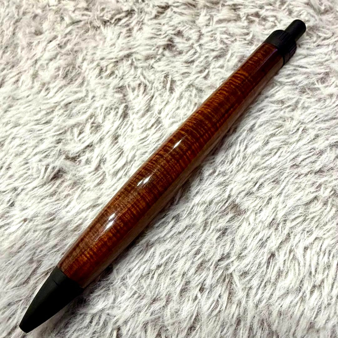 Siamese rosewood wood pen with lacquer finish showing micro-curry grain pattern by Brand
